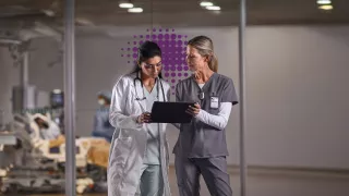 Acute Two nurses purple